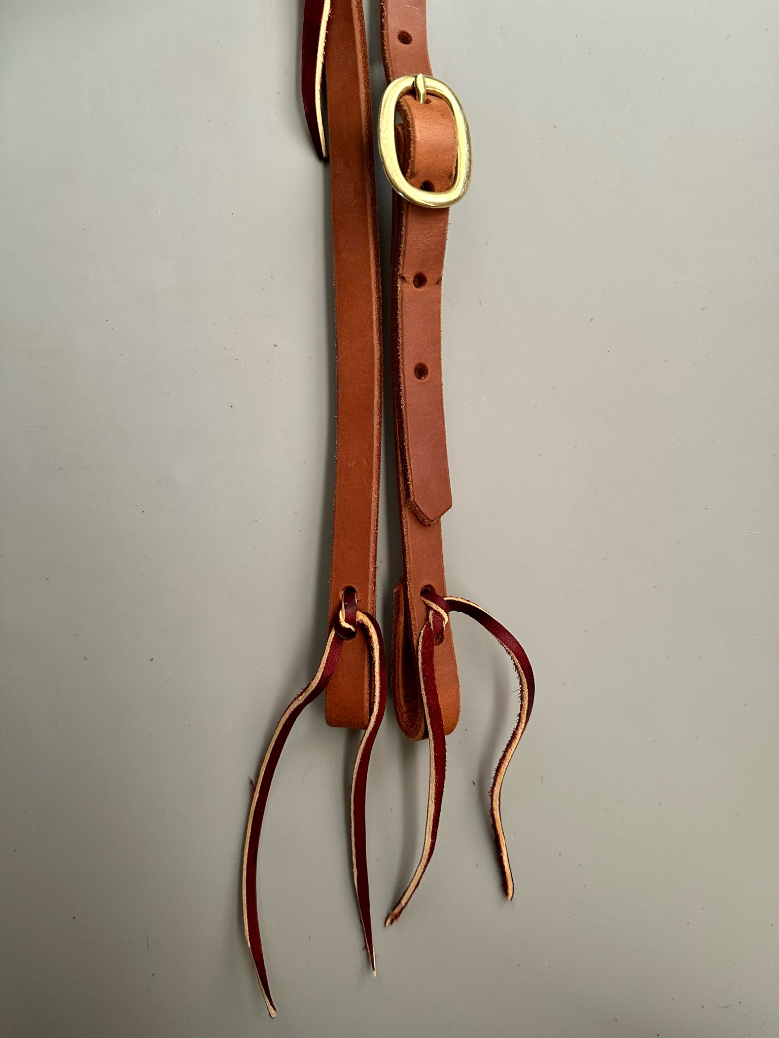 Single Latigo Leather Ear Piece Headstall With One Basic Brass Buckle Width