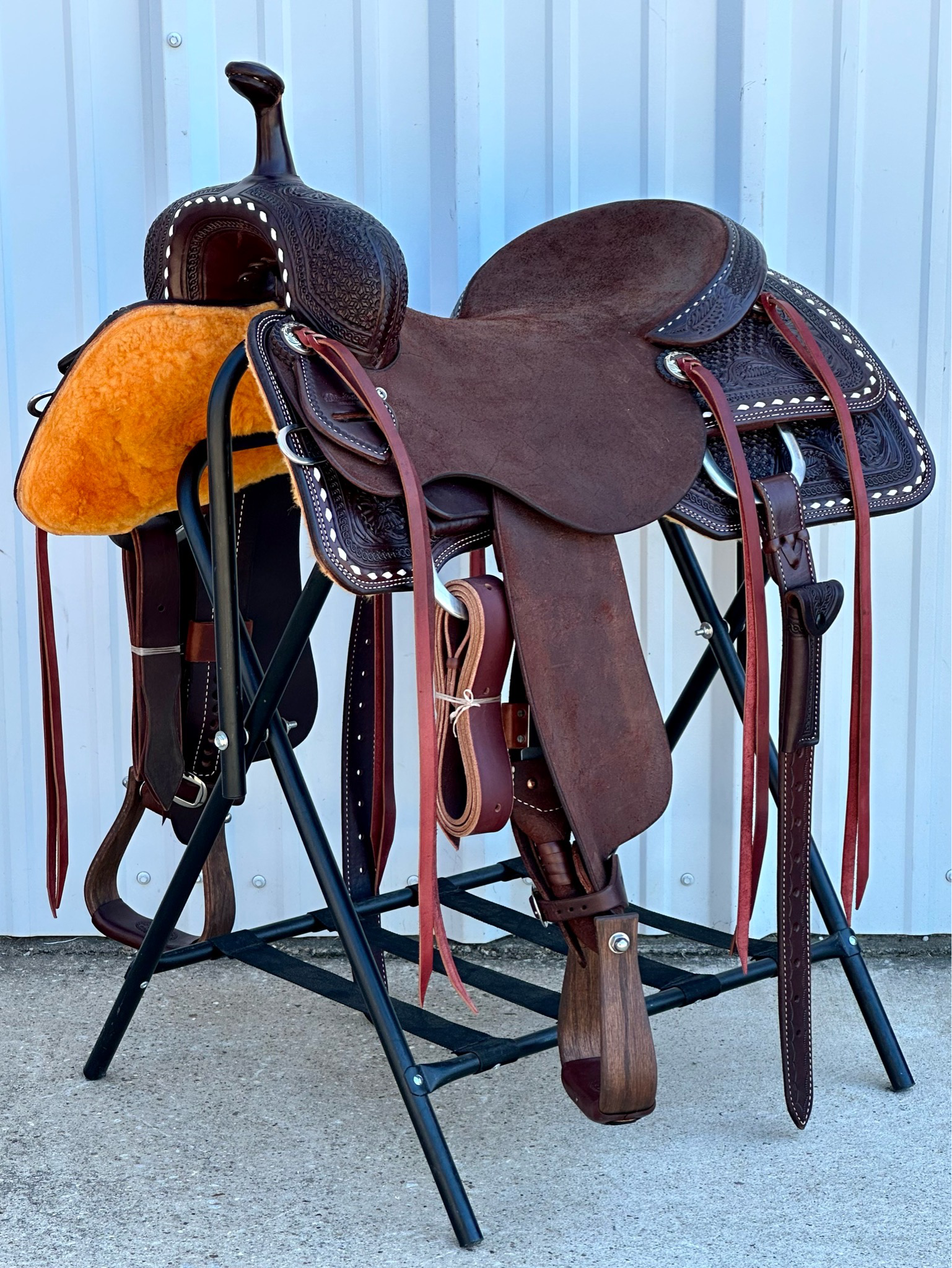 Robert Teskey Elite Cutting Horse Saddle with a 17- inch Rough Out Seat in Dark Oil Finish and White Buckstitch